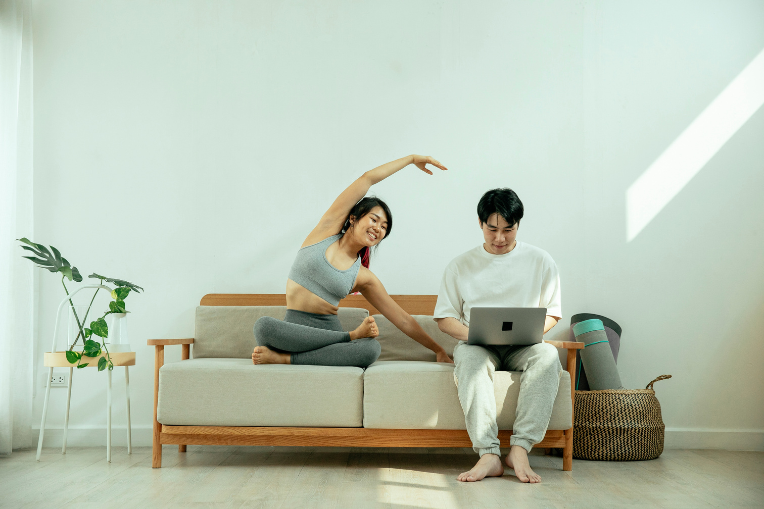 Cute couple sitting on sofa